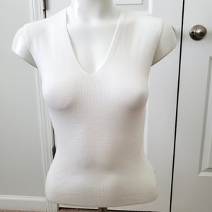 White sleeveless V Neck top